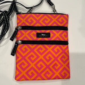 Scout slim crossbody with 3 zipper pockets. Great condition!
